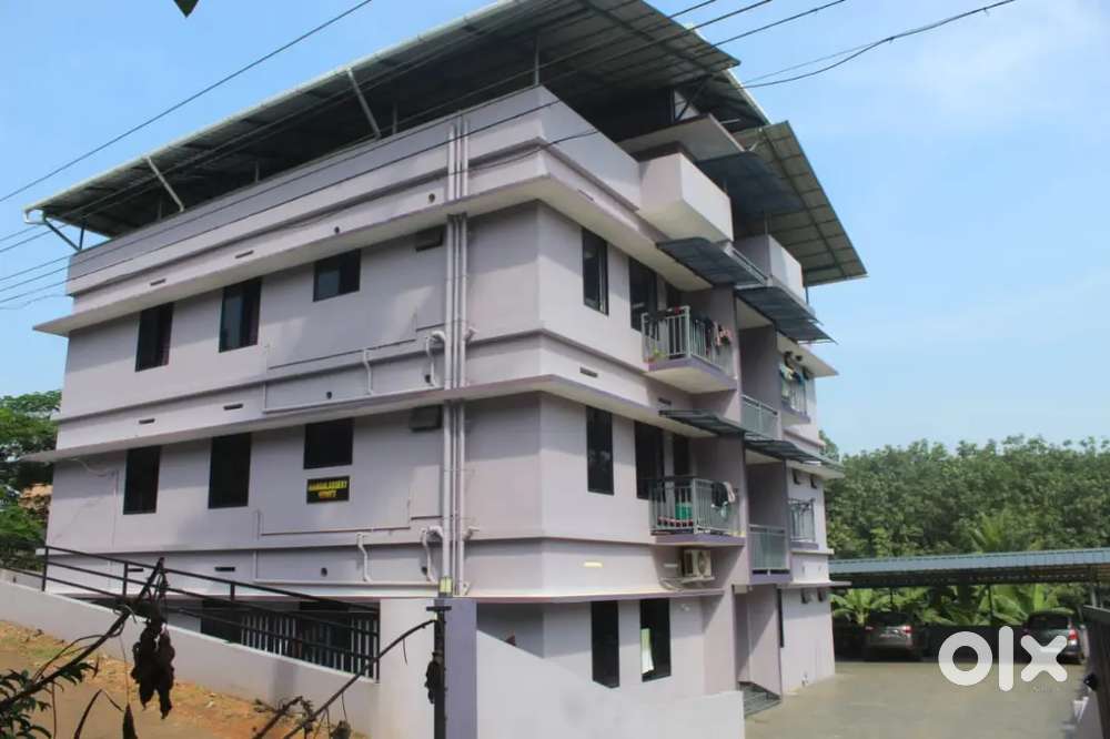 Aluva rajagiri hospital. New apartment 2bhk 1st floor for rent.