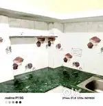 Kitchen aur bathroom mei tiles laga hua ha