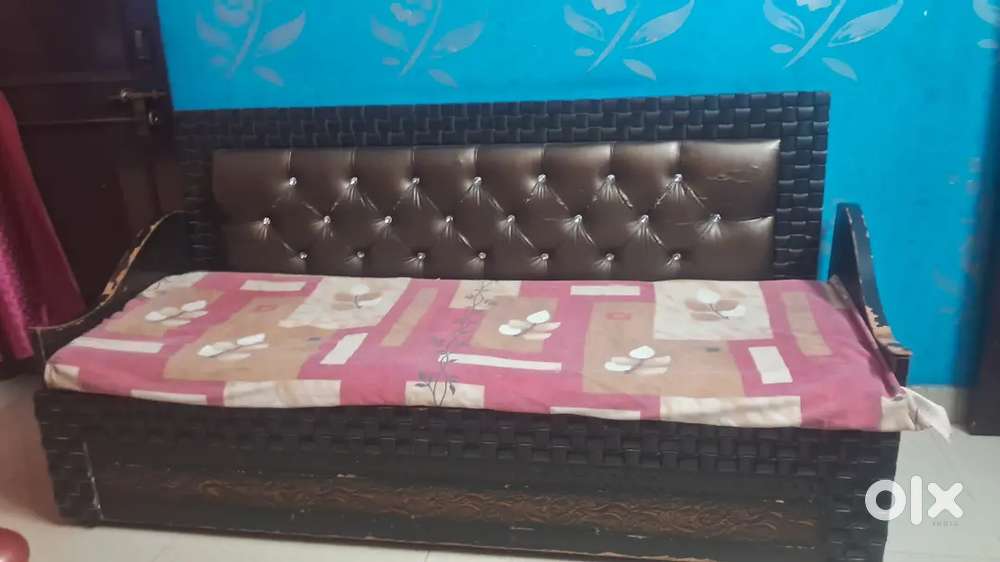 Sofa cum bed with table
