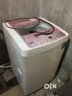 Washing machine lg 6 kg top load.