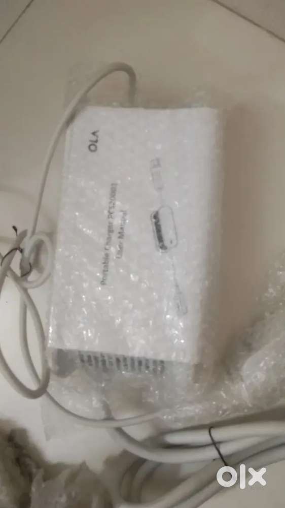 OLA charger  new
