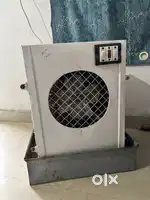 1 NEW COOLER & 1 NEW TABLE FAN