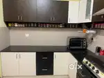 Used Modular Kitchen with all fittings and chimney for sale.