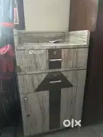 Used wooden cupboard and counter table
