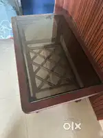 Wooden table with glass table