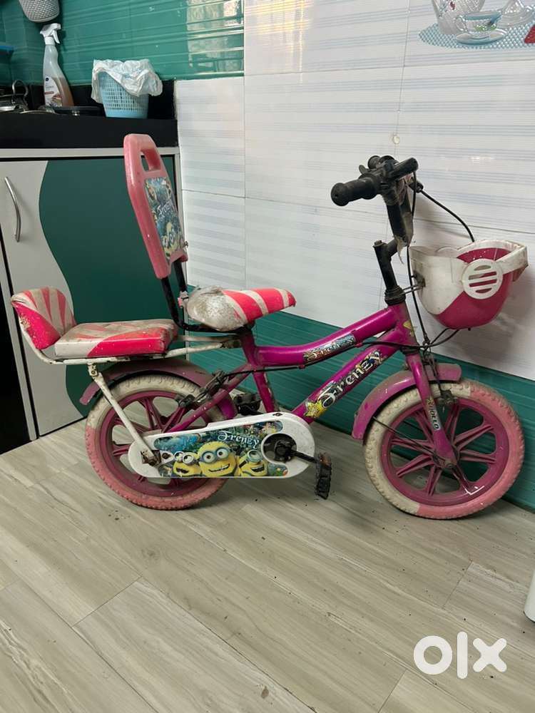 pink child cycle