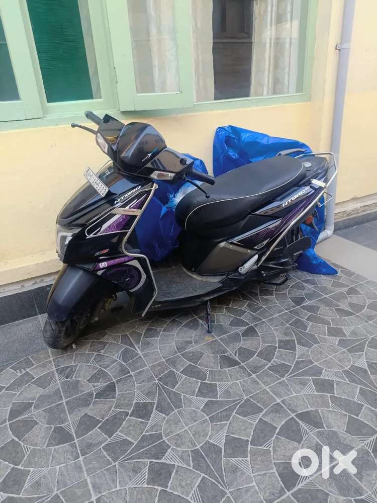 Tvs Ntorq black panther lightly driven in excellent condition