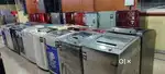 Refrigerator and washing machine in good condition with warranty..*