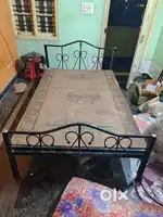 Iron openable bed of standard size worth more than 6200/-