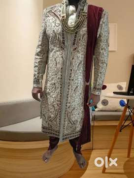 New Designer Authentic sherwani with pants and Neck Mala.