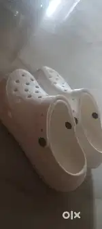 Crocs. Size is 8