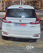 Car on lease Ertiga car 7 sest petrol