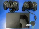ps2 good condition with many games 2controller
