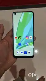 One plus Nord ce 2 with paper and charger.