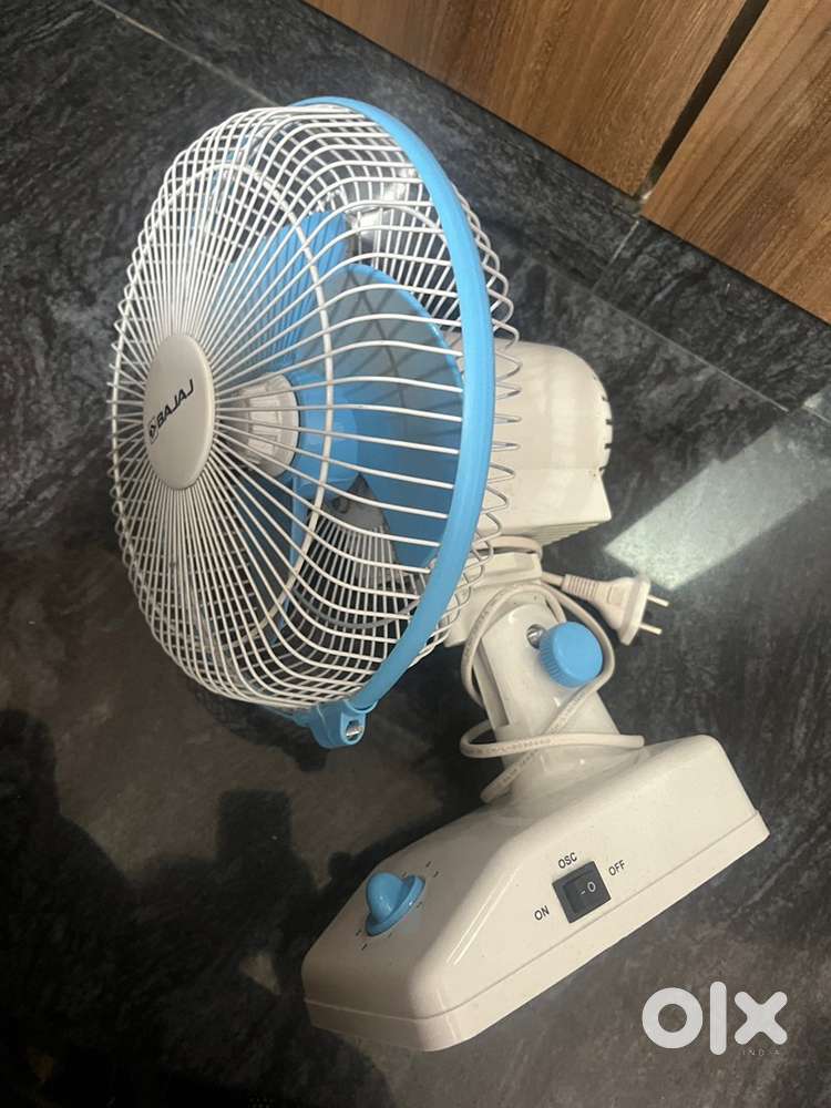 Hinging or small table fan