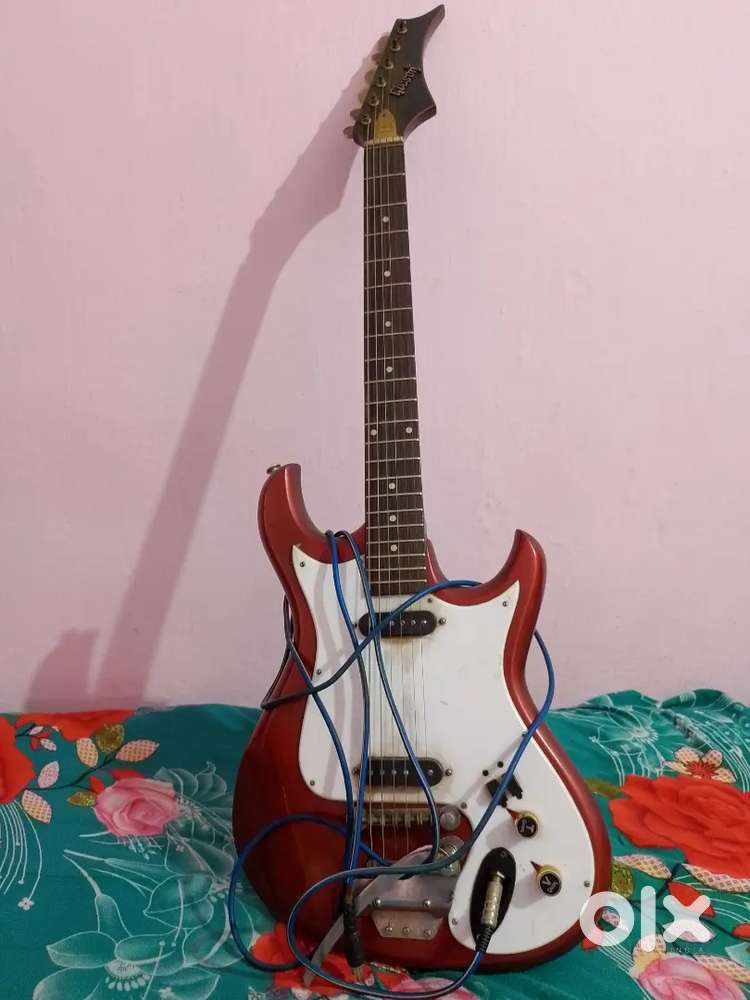 Givson (Solid Electric Guitar):- super deluxe model