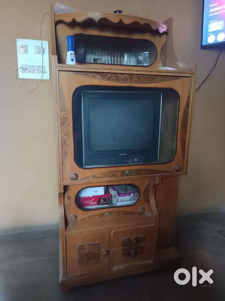 Wooden trolley and colur tv at 8000