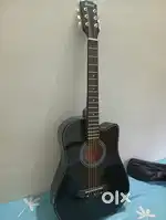 'Acoustic guitar in excellent condition with bag