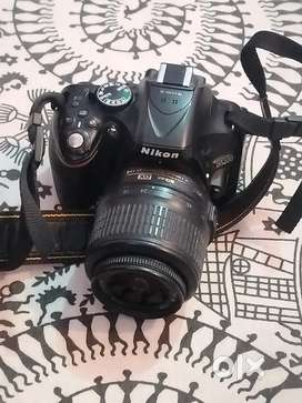 canon D5200 Camera with two lenses charger and 32Gb memory card