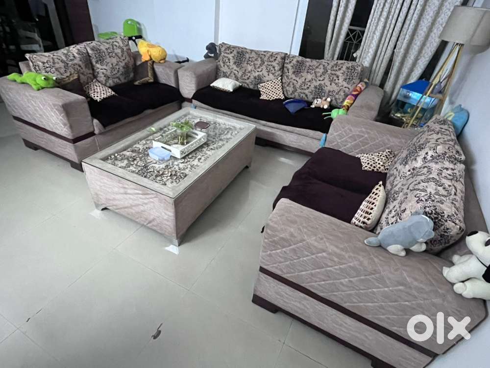 Seven seater sofa set with centre table.