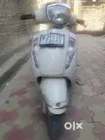 Suzuki access 125 with disk.