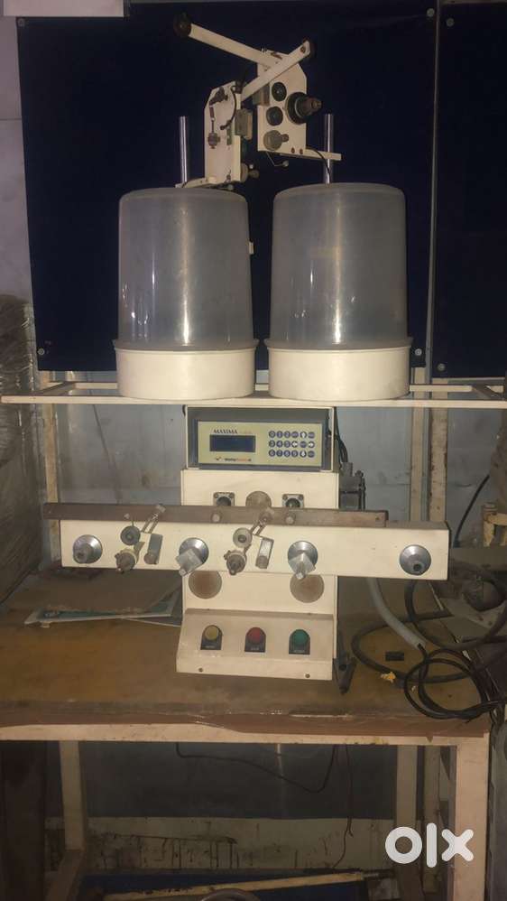 Coil binding machine