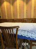 Wooden Dining Table with 8 wooden chairs