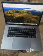 MacBook Pro 2018 with Touch Bar and fingerprint in New Condition