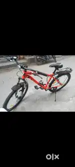 Black and orange peace of bicycle