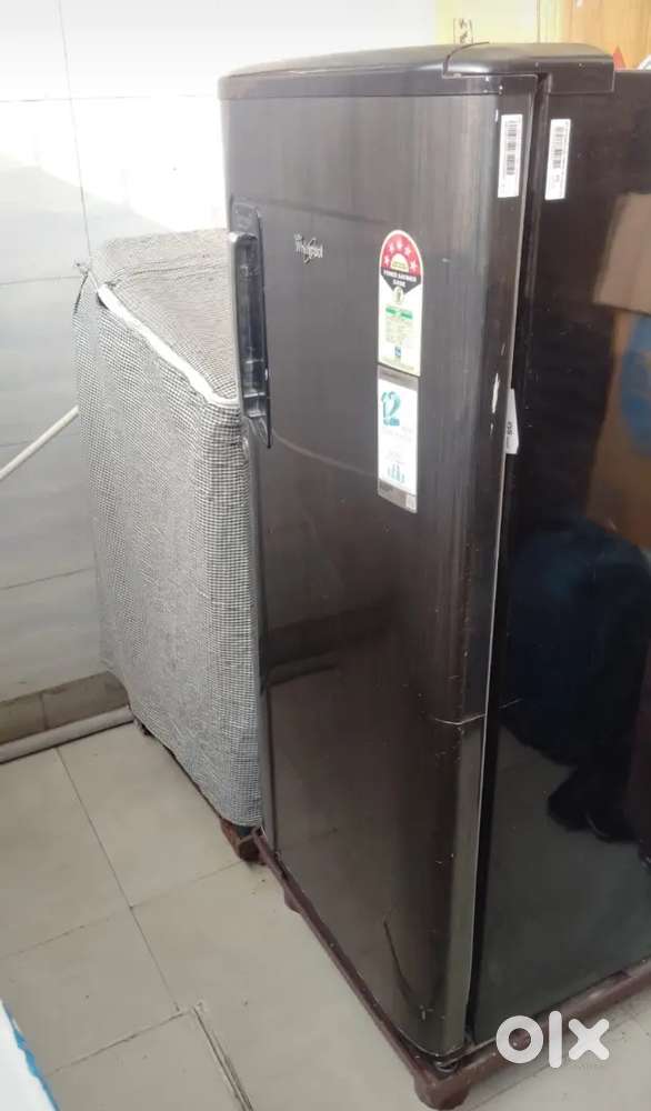 l fridge three yr old new condition and Ushai sewing machine 1. Yr old