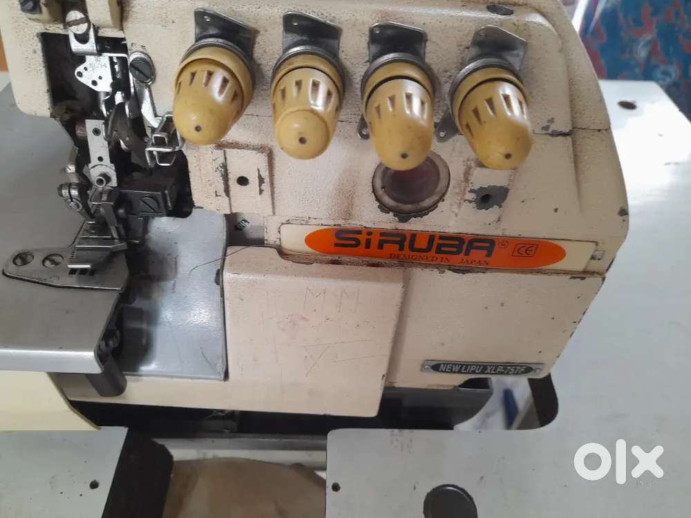 Siruba  power table overlooking machine