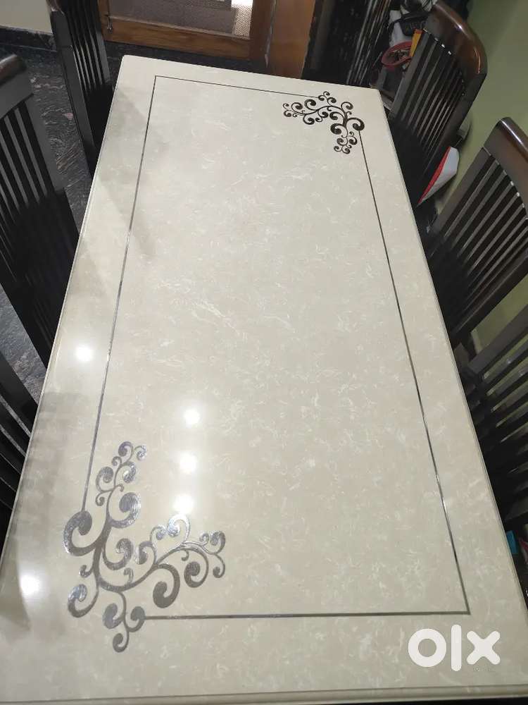 Marble top dining table available