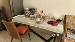 6 sitting Dining table with stainless steel base with 6 comfort chairs