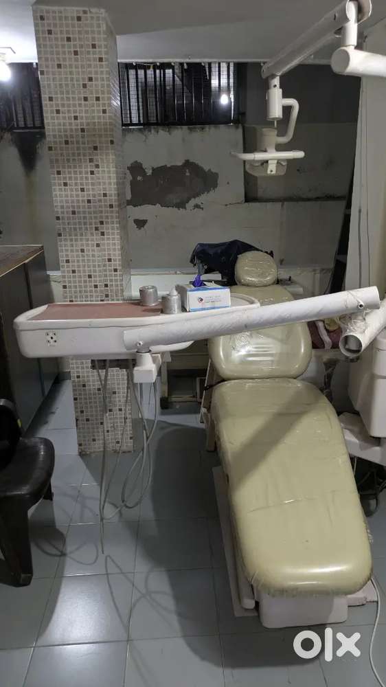 Dental chair with compressor and scaler