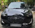 Nissan Magnite Kuro Edition Petrol AMT, 2024, Petrol