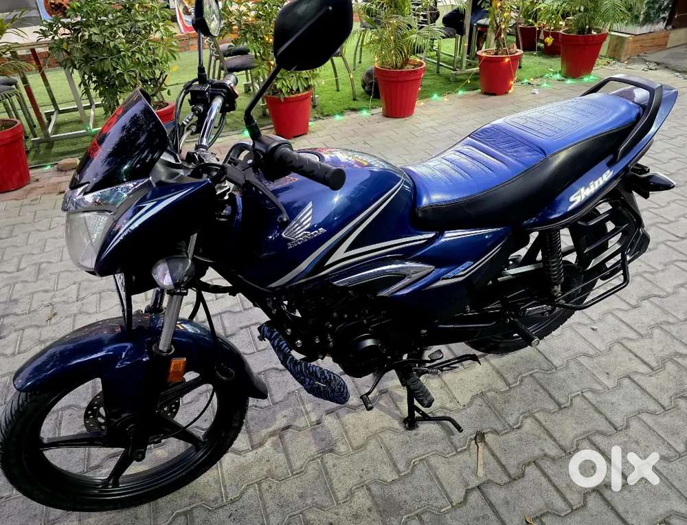 Honda shine in very good condition first owner lone facility available