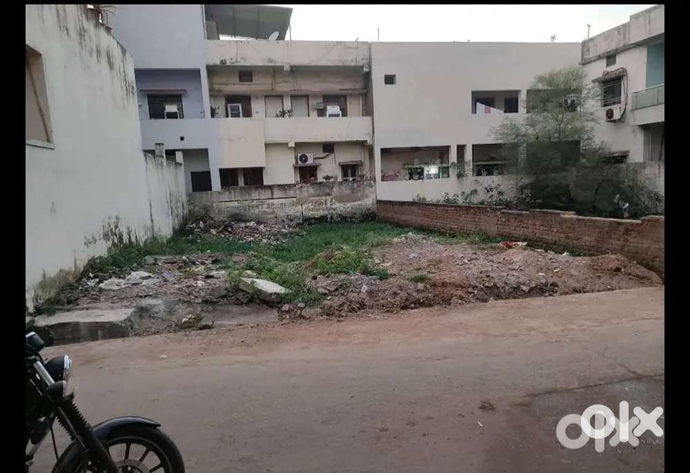 Plot east facing professor Colony