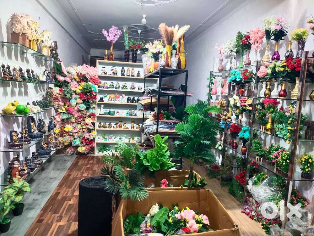 Home decor items like flower, stachu, cenary