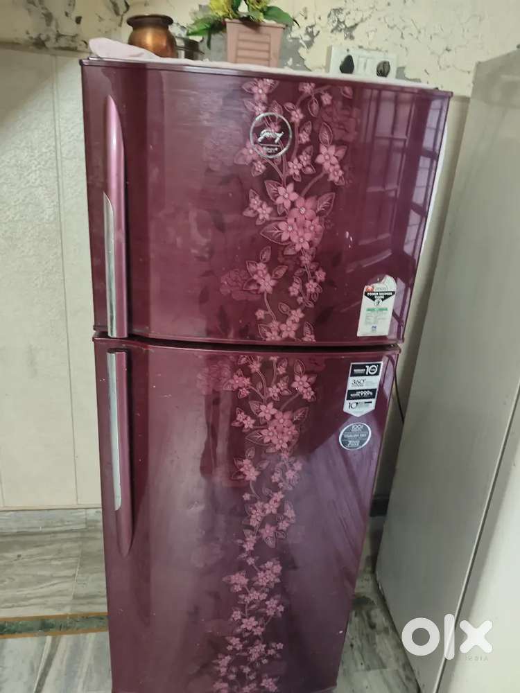 Red coloured fridge