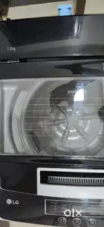 LG top load washing machine - 7 kg (under warranty)