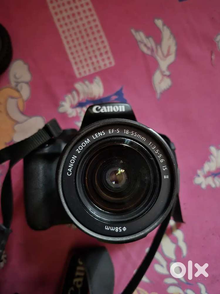 Canon EOS 1300D DSLR camera body with dual lens EF-S 18-55mm IS-