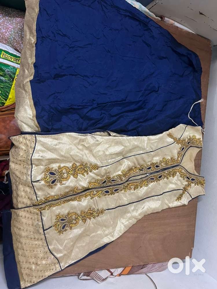 Plain lengha and beautiful long cut top with design