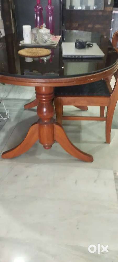 Dinning table with glass top & four chair