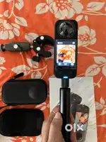 Insta 360 X3 with camera lens bike mount and selfie