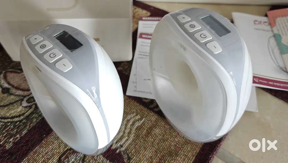 Selling my PROMOM automatic Breast Pump pack of 2 under warranty