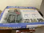 Table mate Iv and one hand bag