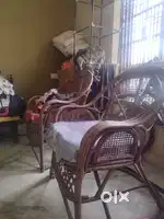 Two bamboo sofa one bamboo table single sofa with cushion