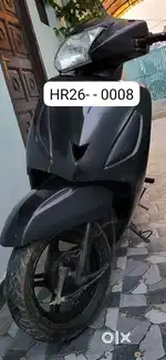 Scooty with vip no. HR26- - 0008 number will be extra charges