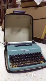 Antique Olivetti Portable Typewriter with new ribbon working
