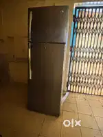 Lg 240 litres double door fridge and wooden chauki single bed